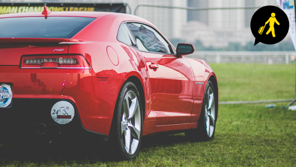 A red car with the Rapid logo in the top corner.